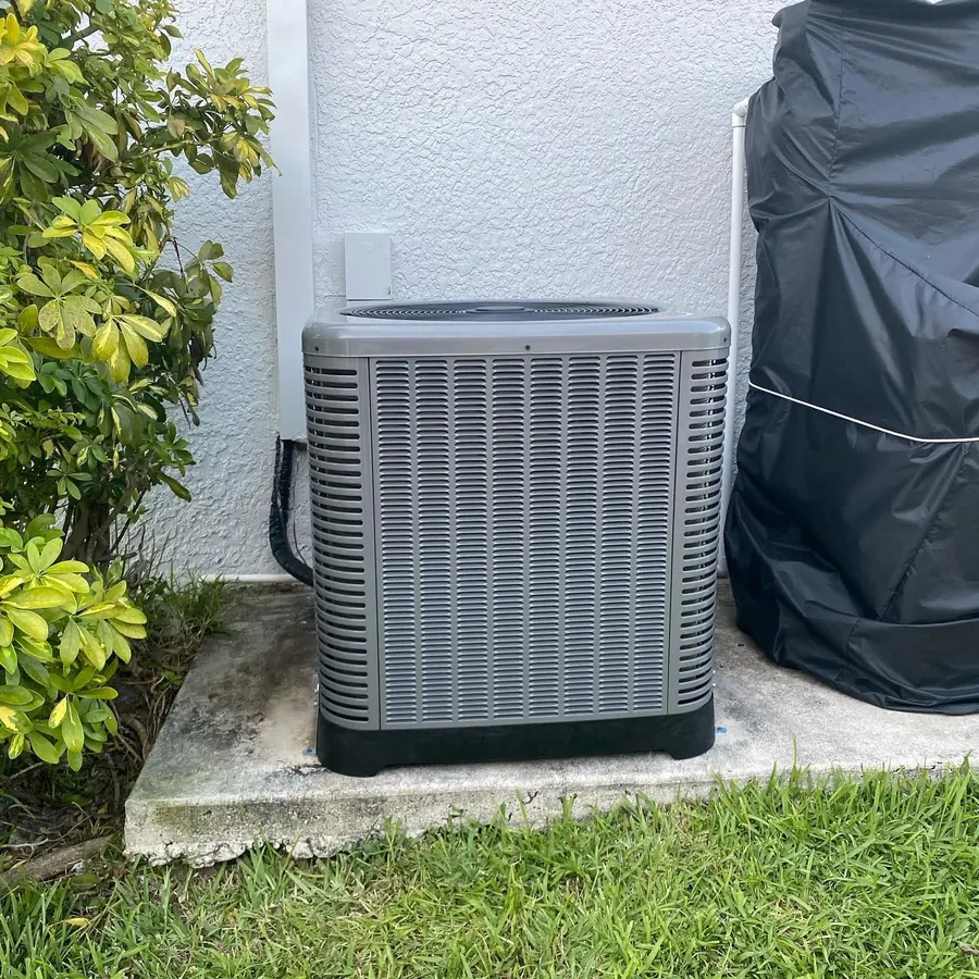 A new condenser installed beside a Cape Coral home
