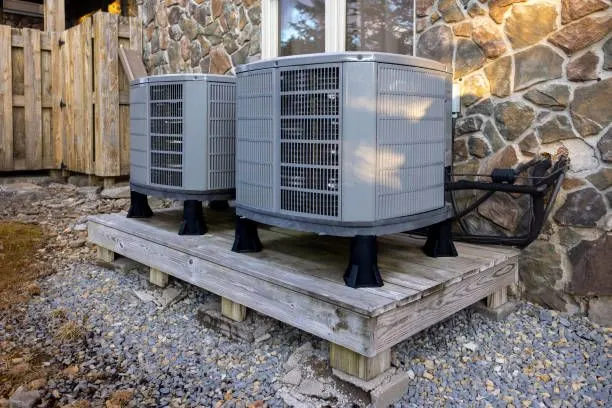 Two condensers on a raised platform